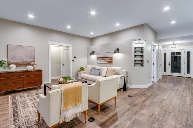 a bedroom with bed and a couch