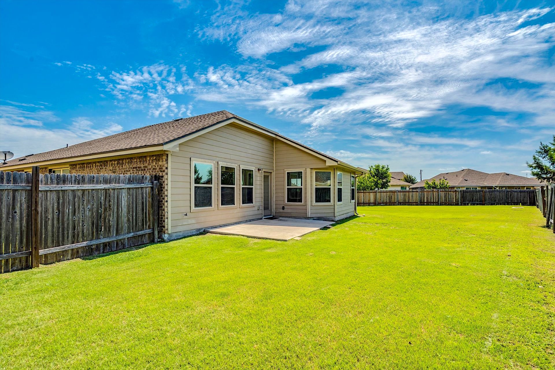 16829 Ruggio Road Pflugerville, TX 78660 - Photo 26 of 40 a view of a house with a swimming pool