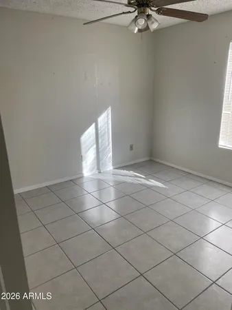 a view of a room that has a window in it