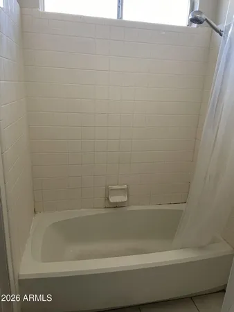 a bathroom with a bathtub