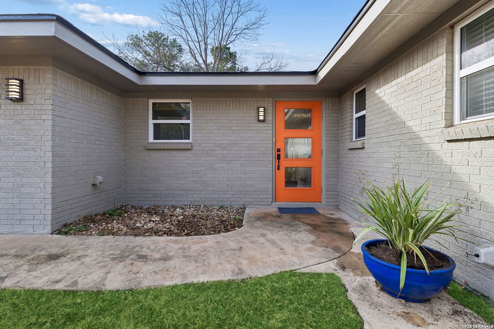 119 Robin Road Highland Haven, TX 78654 - Photo 13 of 33 a front view of a house with a yard