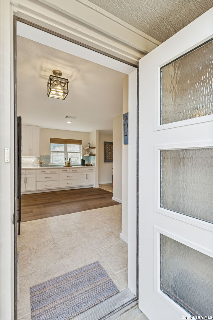 119 Robin Road Highland Haven, TX 78654 - Photo 14 of 33 a view of a living room