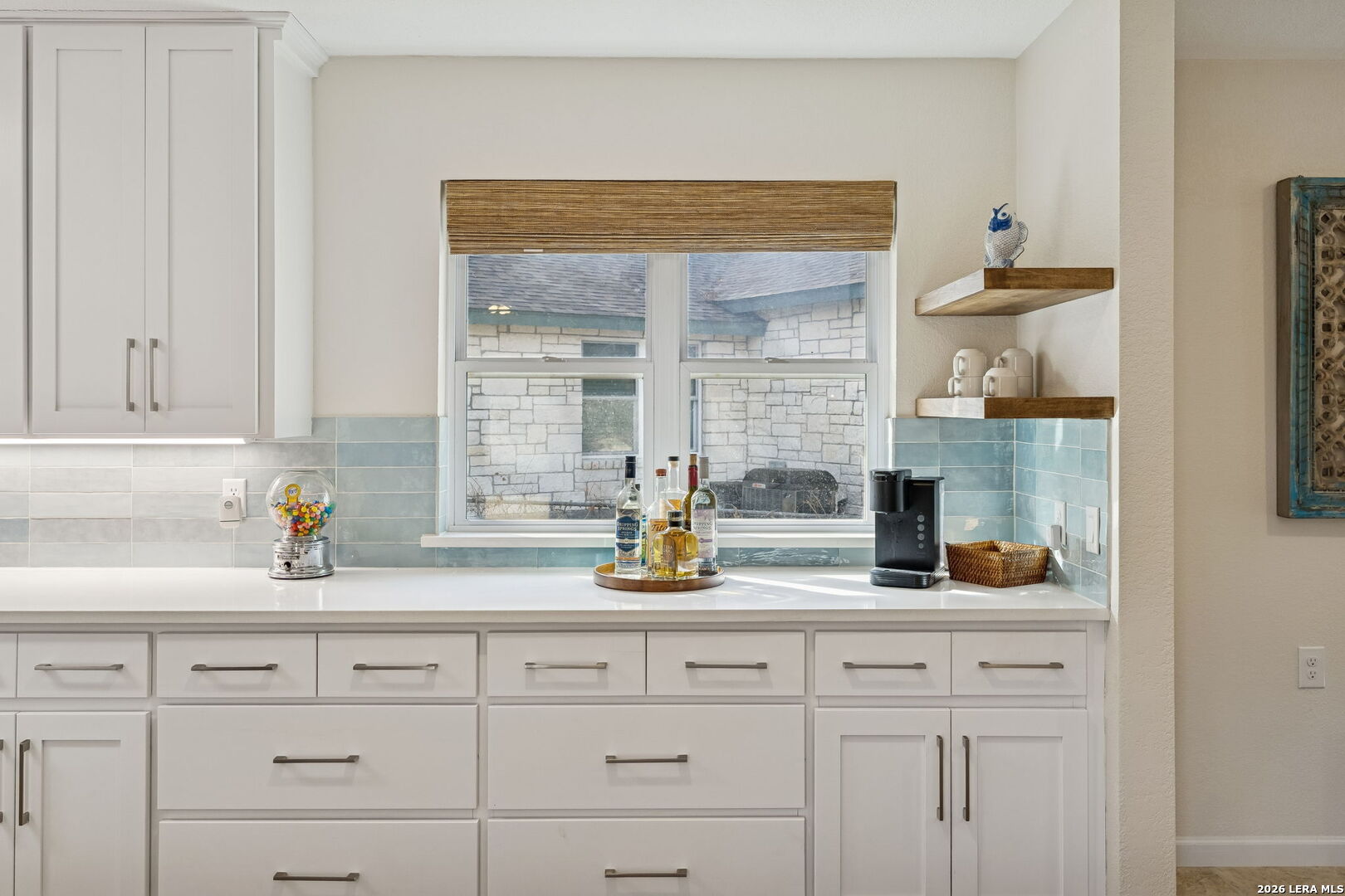 119 Robin Road Highland Haven, TX 78654 - Photo 17 of 33 a kitchen with a sink and a window