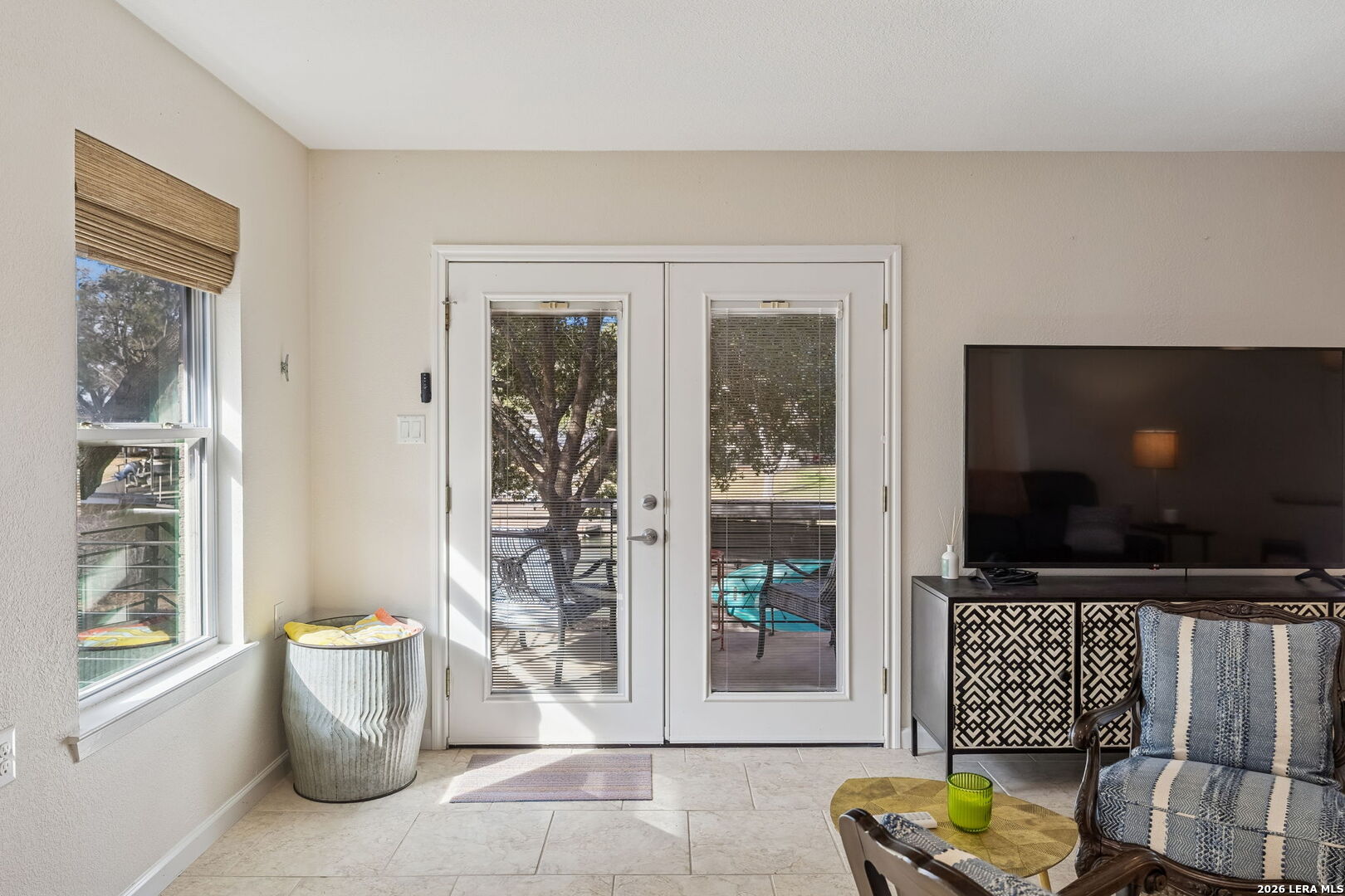 119 Robin Road Highland Haven, TX 78654 - Photo 22 of 33 a living room with furniture and a flat screen tv