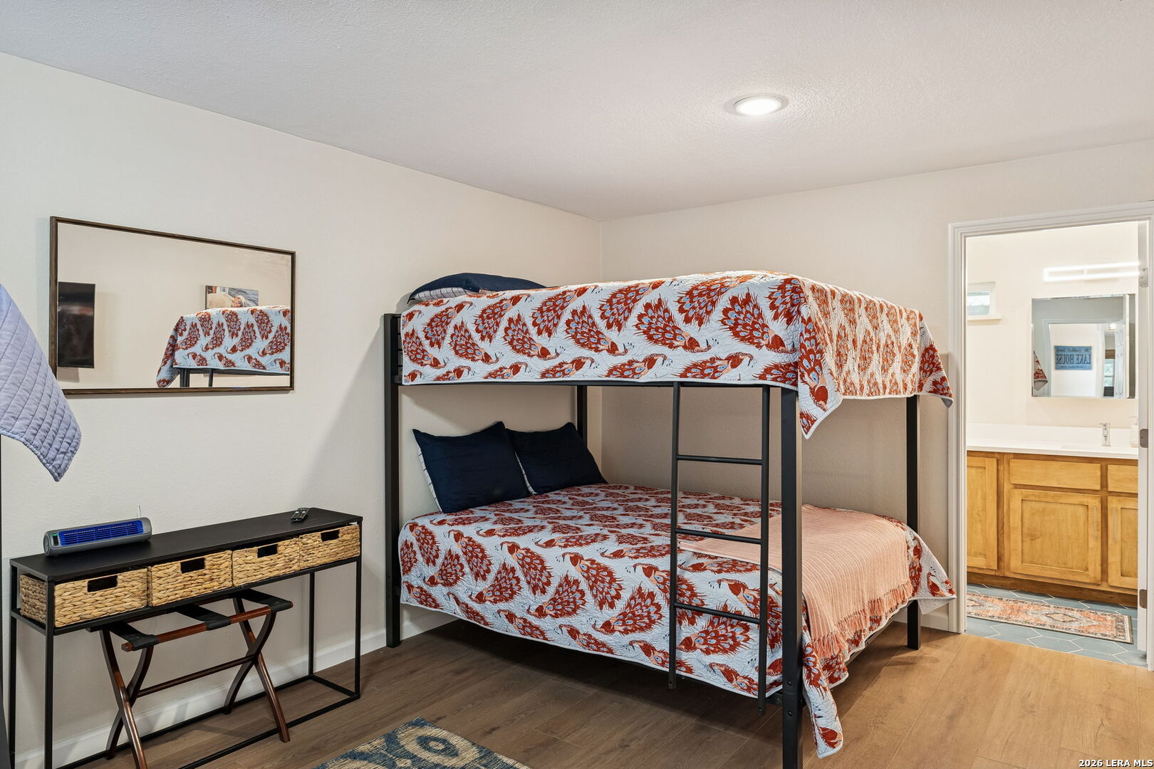 119 Robin Road Highland Haven, TX 78654 - Photo 27 of 33 a bedroom with a bed and window