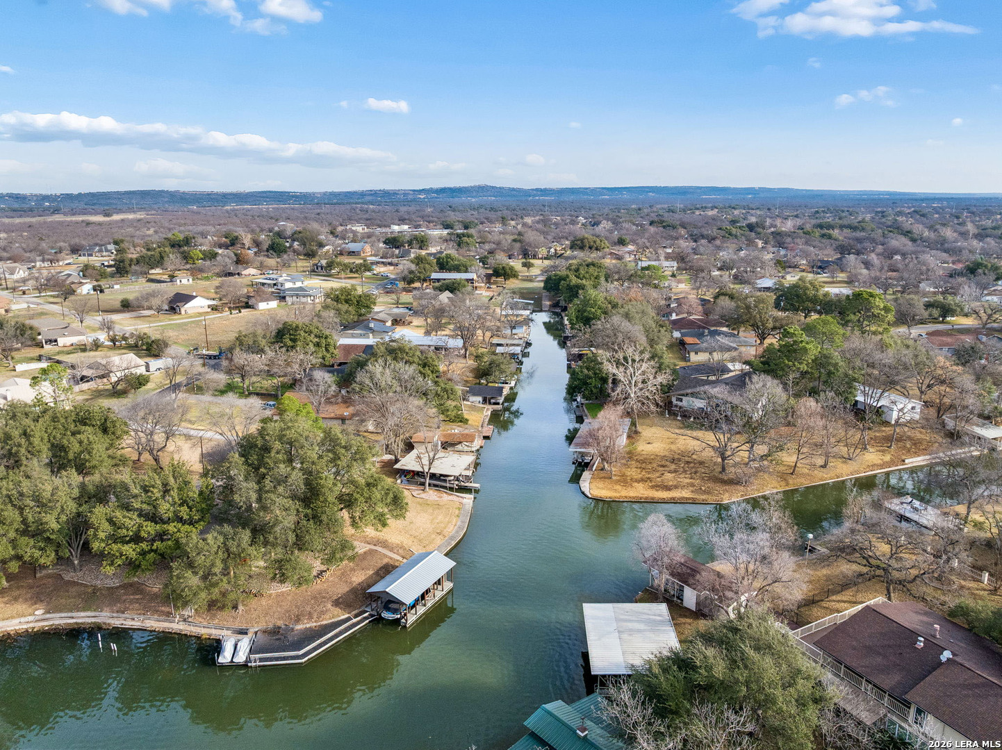 119 Robin Road Highland Haven, TX 78654 - Photo 33 of 33 an aerial view of residential houses with outdoor space
