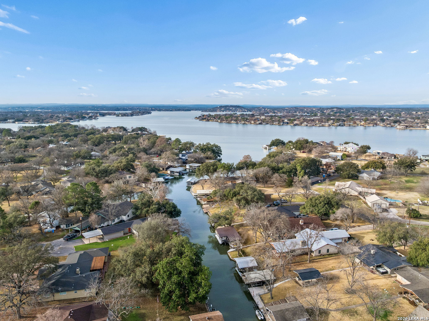 119 Robin Road Highland Haven, TX 78654 - Photo 6 of 33 an aerial view of residential building with ocean view
