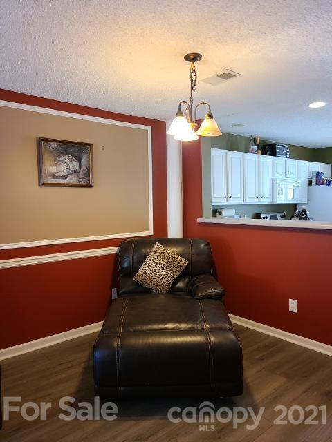 205 Butler Place Fort Mill, SC 29715 - Photo 4 of 13 a living room with hard wood flooring
