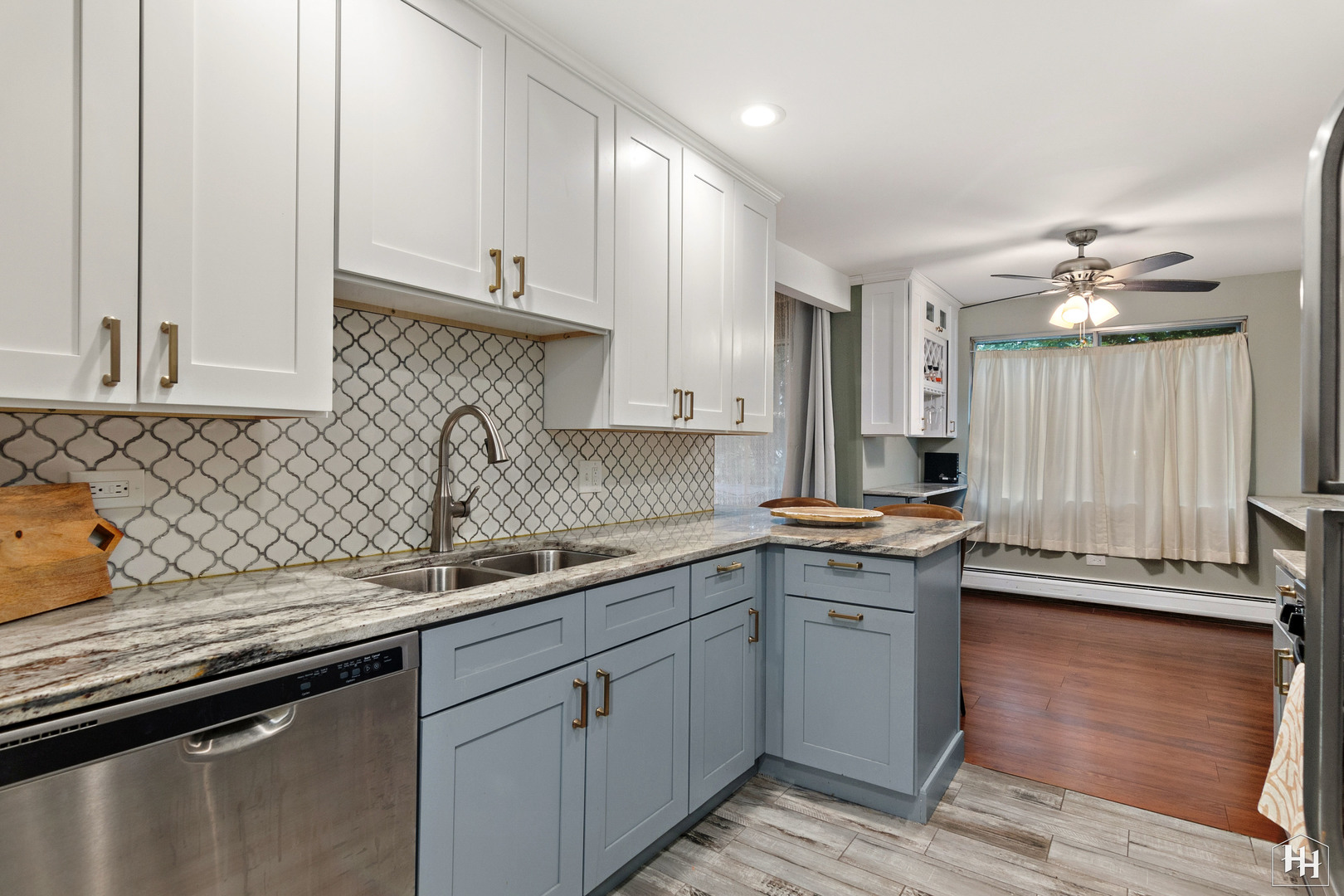 940 East Old Willow Road, Unit 206 Prospect Heights, IL 60070 - Photo 11 of 25 a kitchen with a sink stove and cabinets
