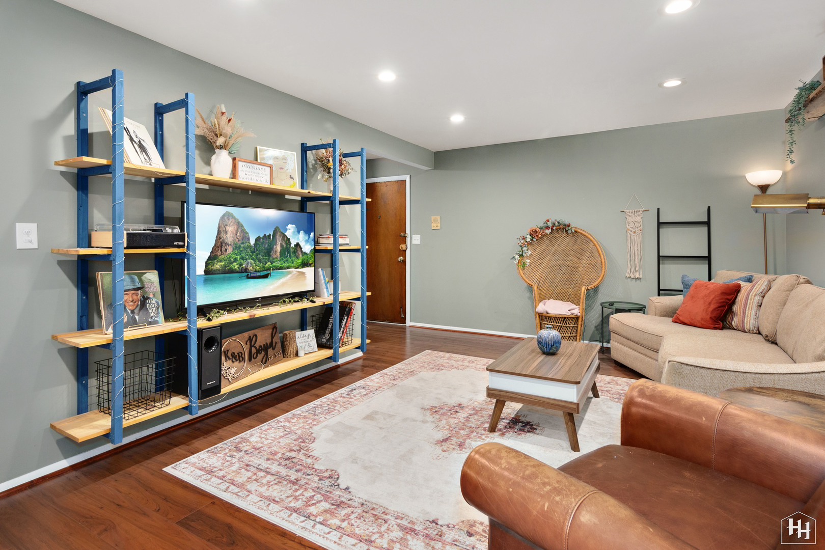 940 East Old Willow Road, Unit 206 Prospect Heights, IL 60070 - Photo 4 of 25 a living room with furniture and a flat screen tv