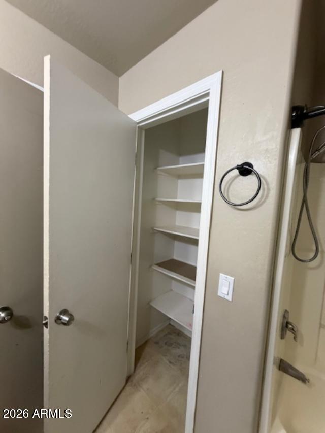 307 South Carter Ranch Road Coolidge, AZ 85128 - Photo 11 of 17 a bathroom with a shower