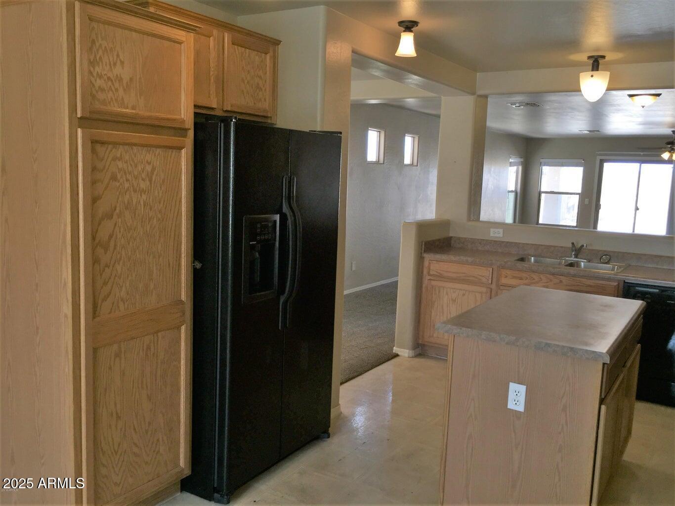 307 South Carter Ranch Road Coolidge, AZ 85128 - Photo 4 of 7 a bathroom with a granite countertop sink a shower and a mirror