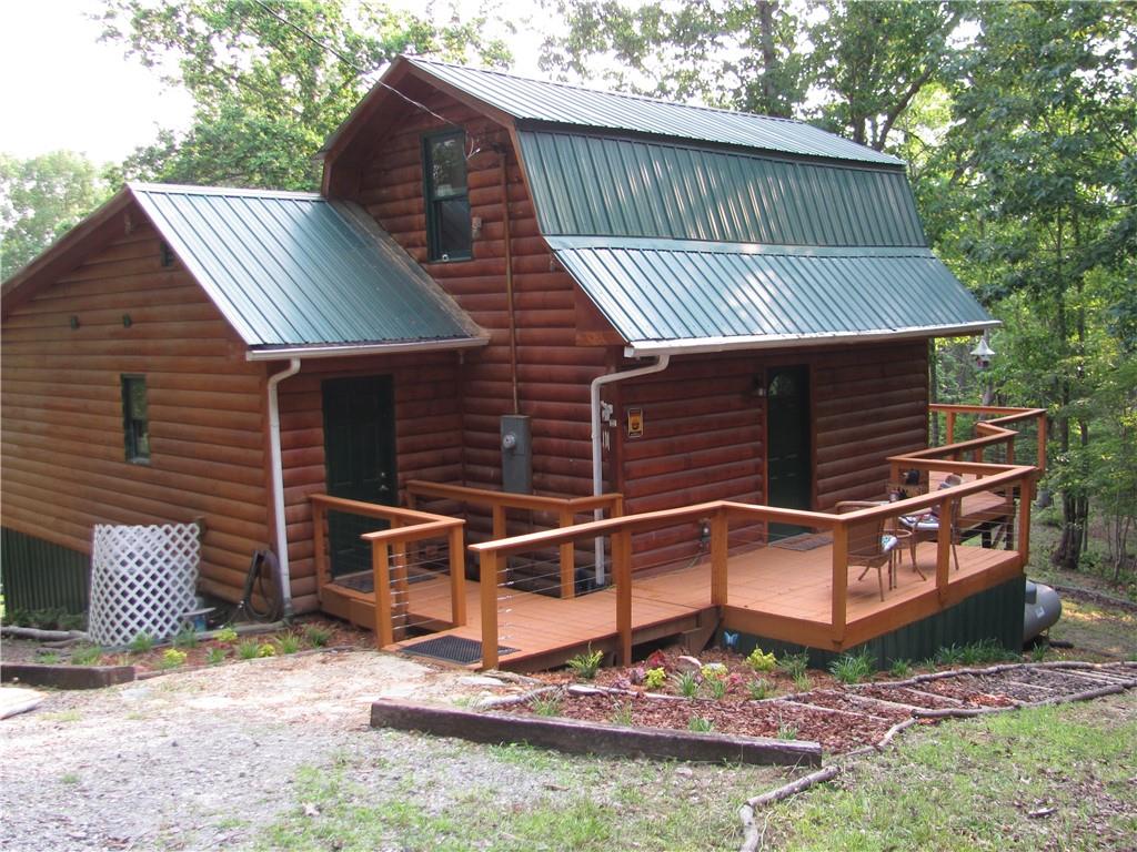 487 Angel Road Fairmount, GA 30139 - Photo 11 of 33 a front view of a house with garden