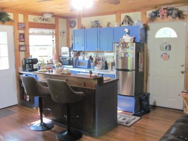 487 Angel Road Fairmount, GA 30139 - Photo 18 of 33 a kitchen with a refrigerator a stove a sink and cabinets