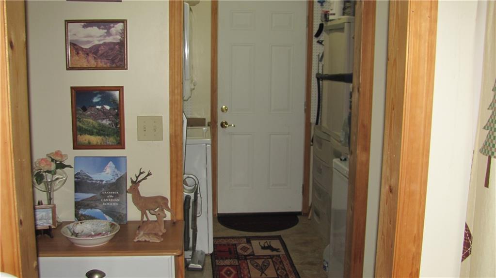 487 Angel Road Fairmount, GA 30139 - Photo 26 of 33 a bathroom with a glass shower door