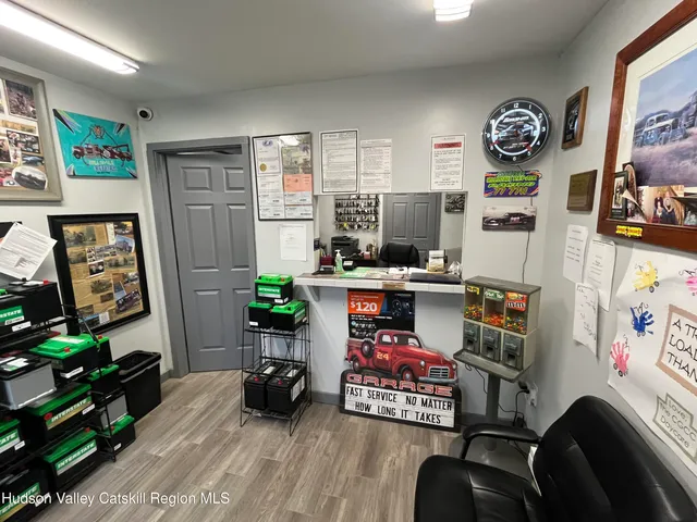 a room with furniture and a flat screen tv