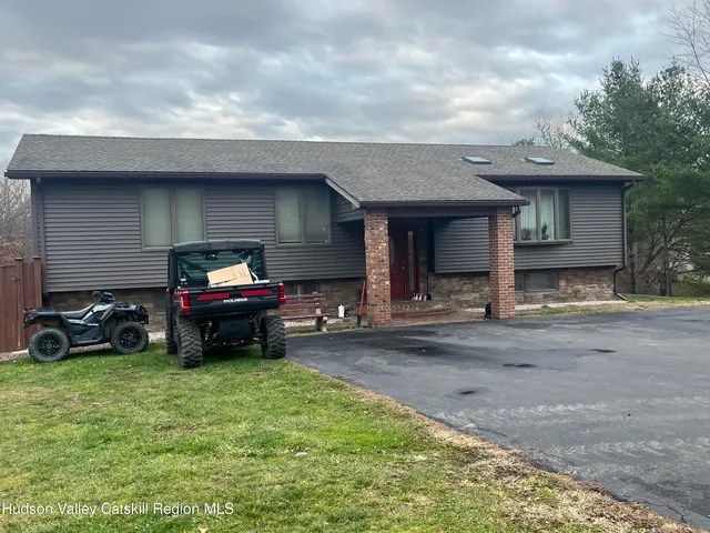 a car parked in front of a house