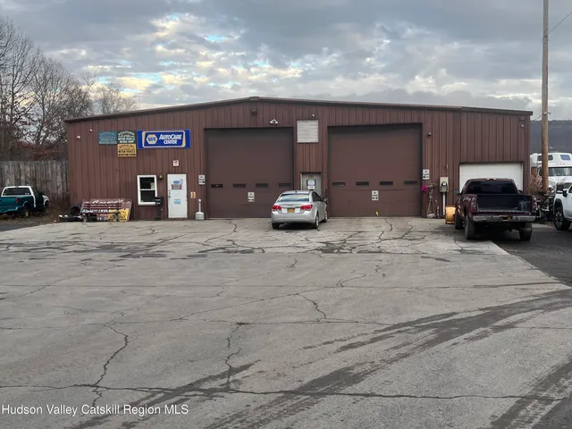 a car parked in parking area of a house
