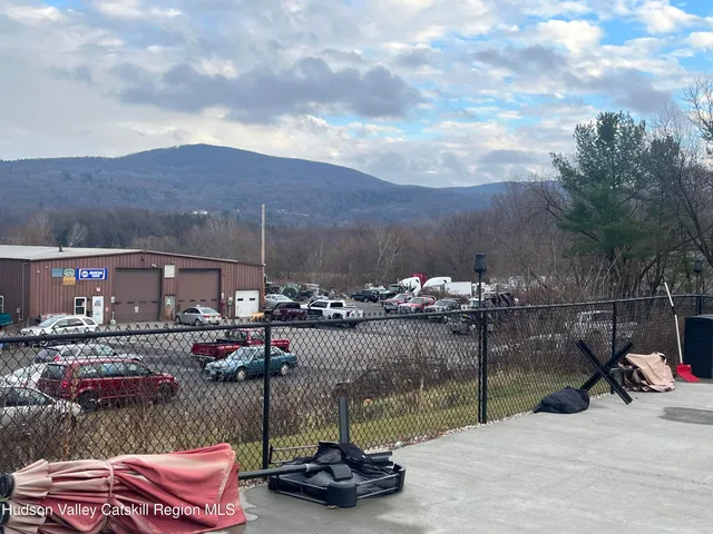 a view of a lake from a balcony