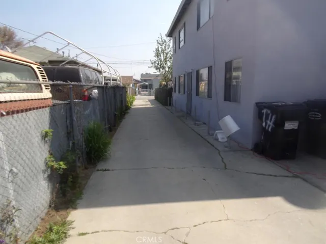 a view of a street with sitting area