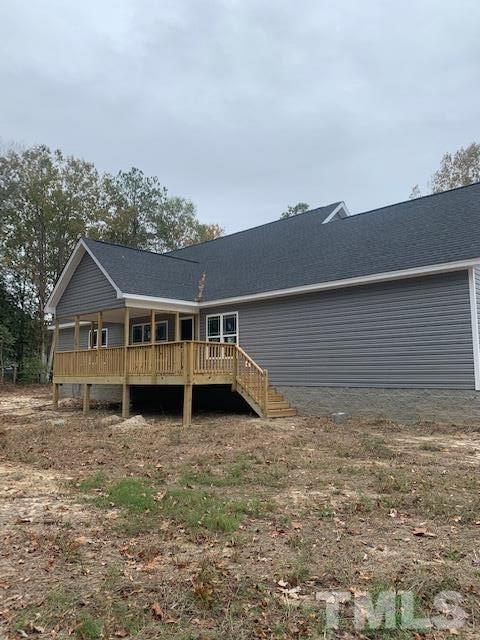 1359 Cobb Road Benson, NC 27504 - Photo 7 of 10 a house that has a big yard in front of it