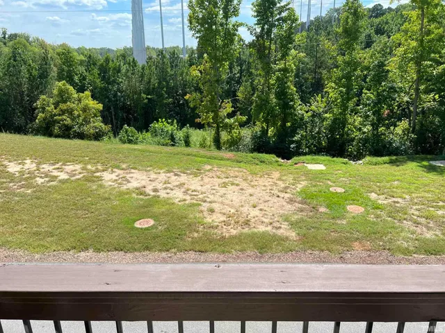 a view of a yard with an outdoor space
