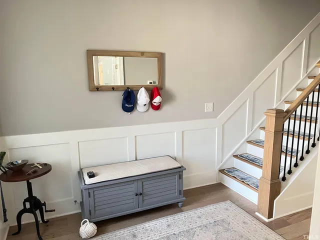 a view of room with furniture and stairs