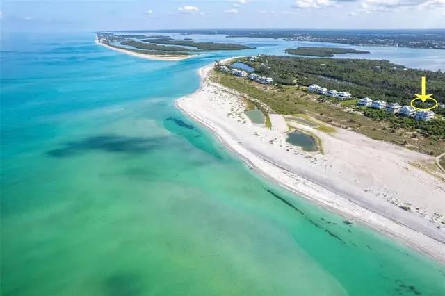 a view of an ocean and a building