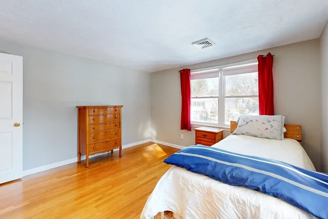 a spacious bathroom with sink shower and bathtub