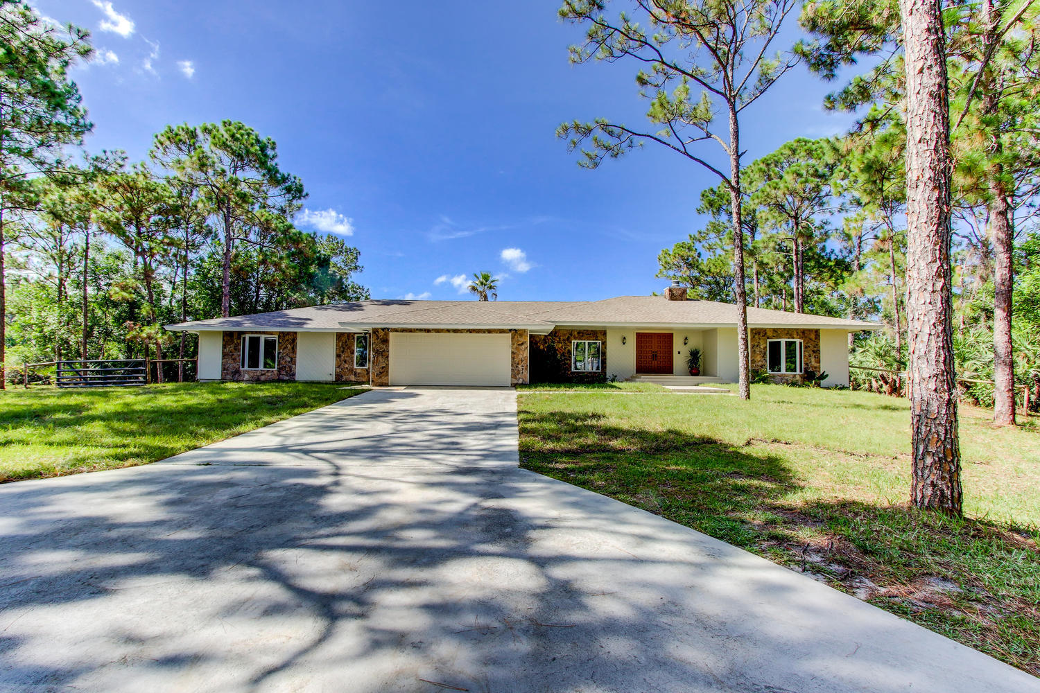 10969 Sandy Run Road Jupiter, FL 33478 - Photo 2 of 31 front