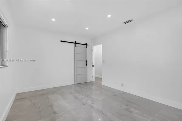 $18,900 | 607 Layne Boulevard, Hallandale Beach, FL 33009