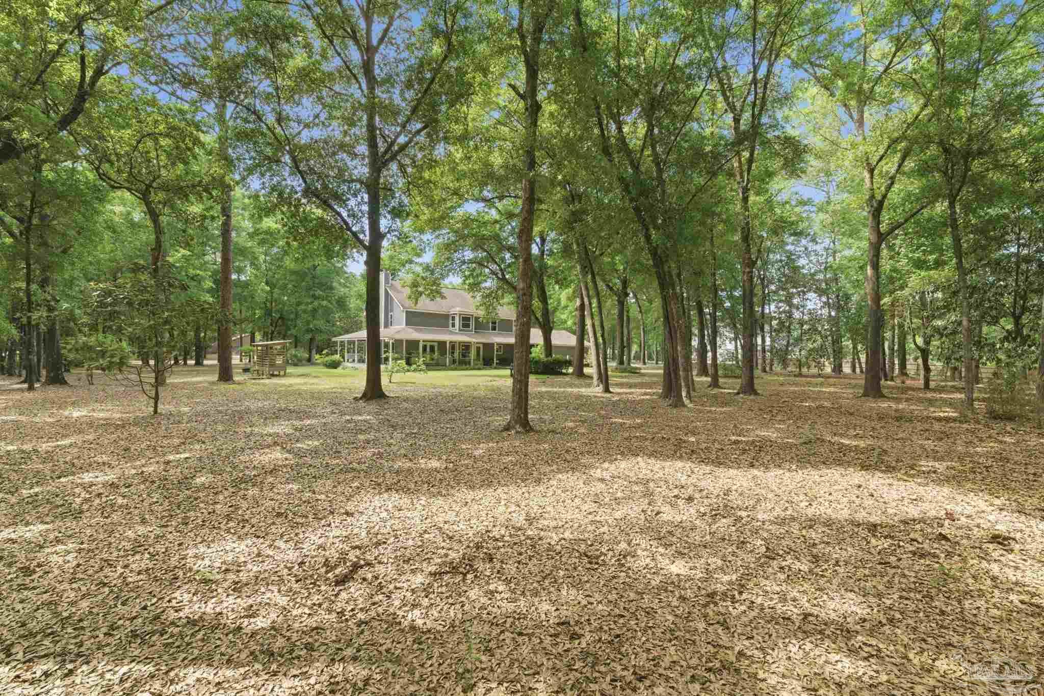 6930 Summit Way Milton, FL 32570 - Photo 50 of 71 a view of outdoor space with trees