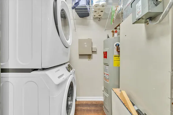 a view of a livingroom with furniture and a fireplace
