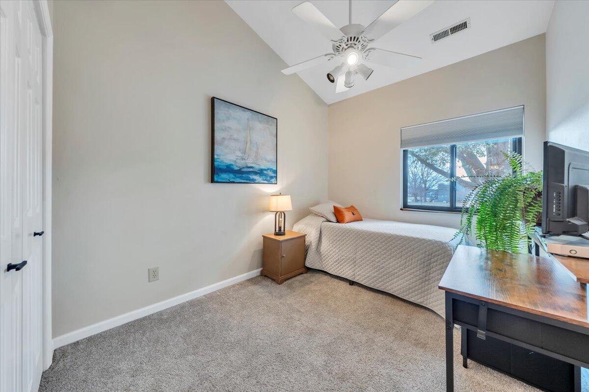 93 Peninsula Point Drive, Unit B5 Moneta, VA 24121 - Photo 31 of 48 a living room with furniture and a potted plant