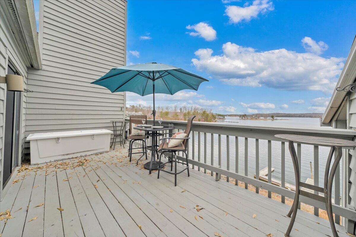 93 Peninsula Point Drive, Unit B5 Moneta, VA 24121 - Photo 34 of 48 a view of a chairs on a deck