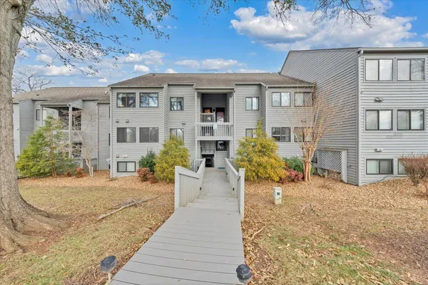 a water pool with view of buildings