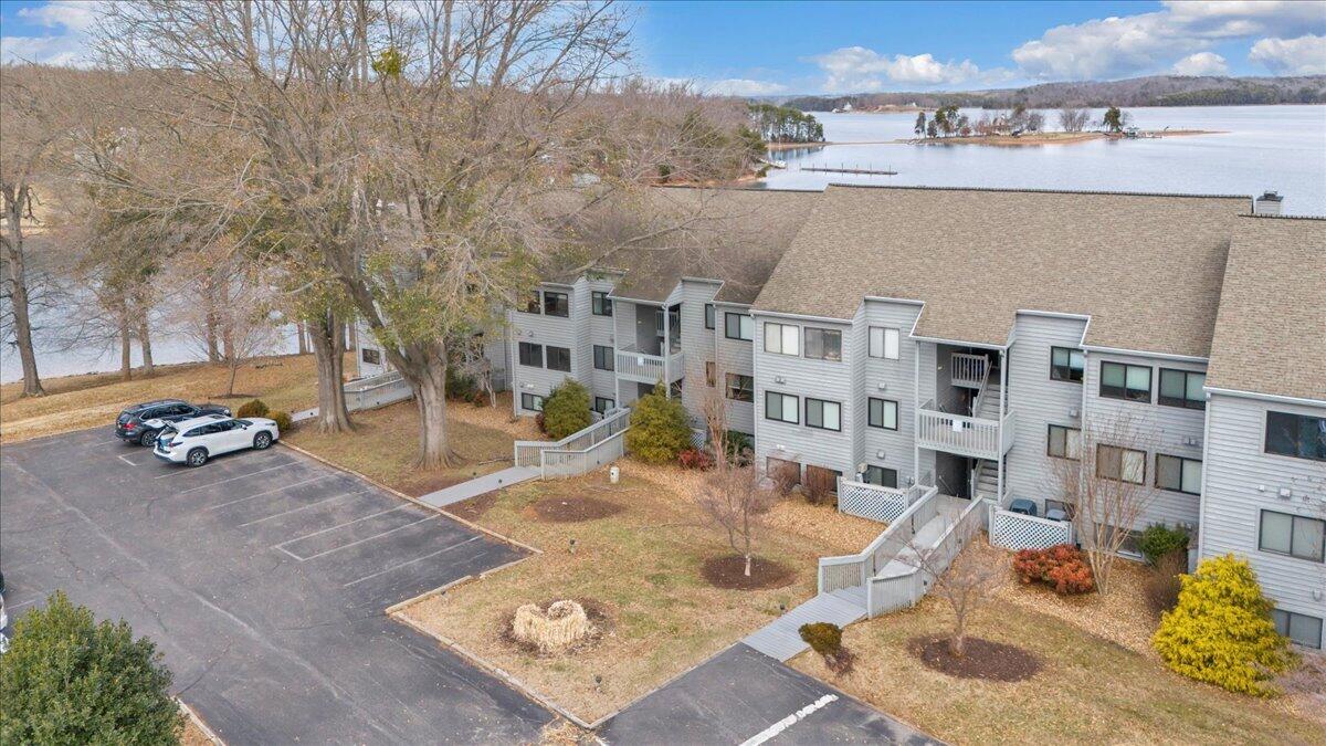 93 Peninsula Point Drive, Unit B5 Moneta, VA 24121 - Photo 47 of 48 an aerial view of residential houses with outdoor space