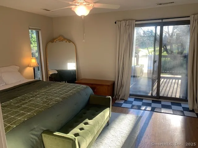 a view of a two chairs in the deck