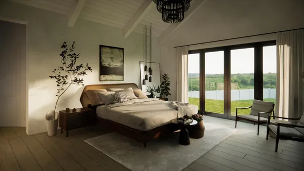 a bedroom with bed and glass door