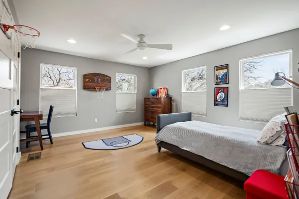 a bedroom with a bed and furniture