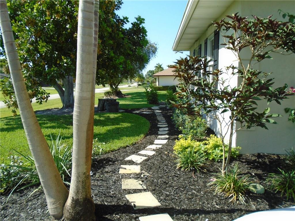 2185 Southeast Harding Street Port St. Lucie, FL 34952 - Photo 34 of 34 a view of a garden with plants