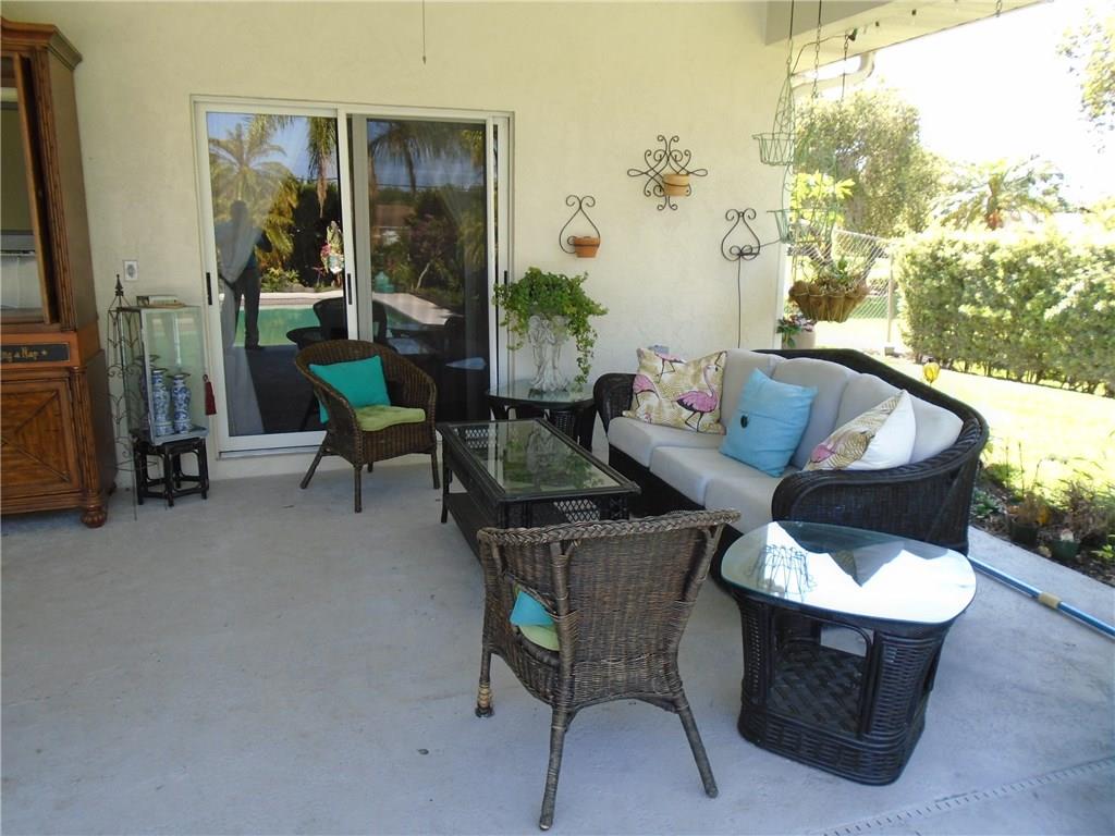 2185 Southeast Harding Street Port St. Lucie, FL 34952 - Photo 7 of 34 a living room with furniture and a window