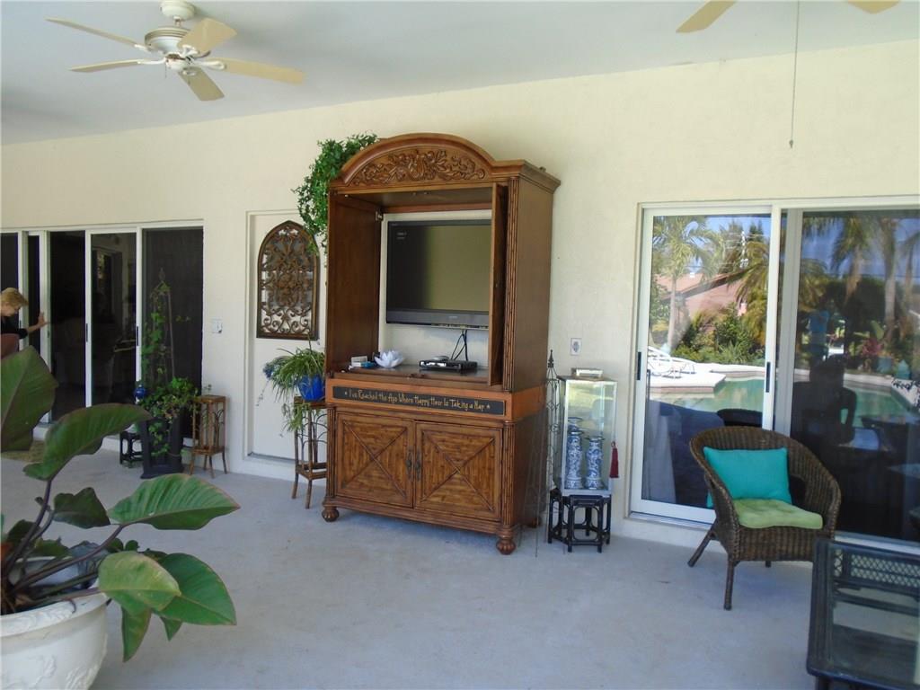 2185 Southeast Harding Street Port St. Lucie, FL 34952 - Photo 8 of 34 a living room with furniture and a window