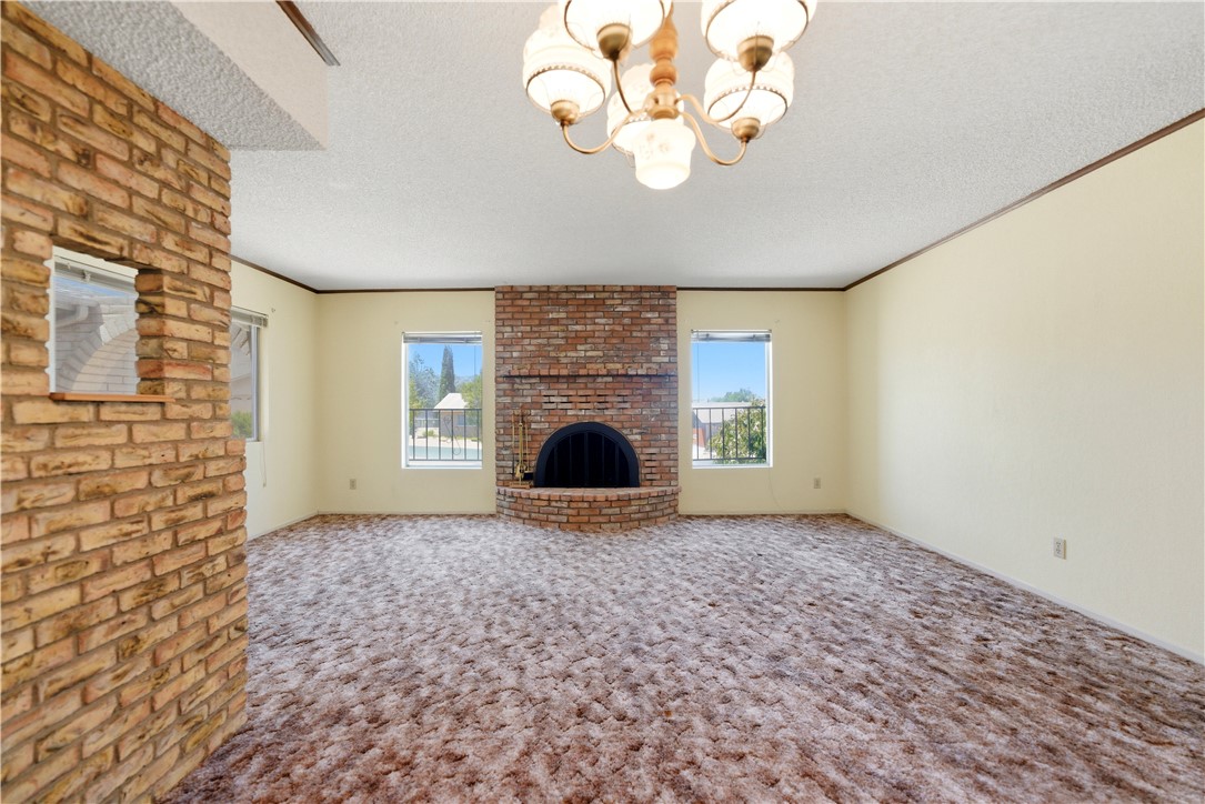 590 Ridgecrest Drive Kingman, AZ 86409 - Photo 8 of 33 a view of livingroom with a fireplace