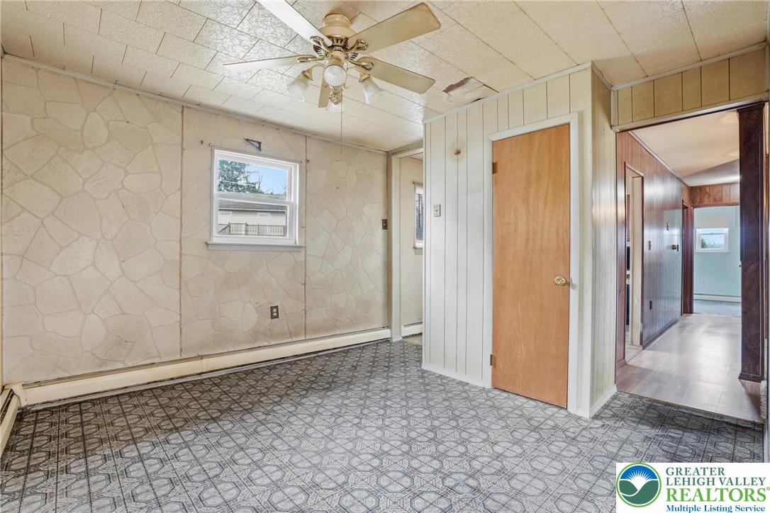 5478 2nd Street Whitehall, PA 18052 - Photo 11 of 30 a view of a hallway with a chandelier fan