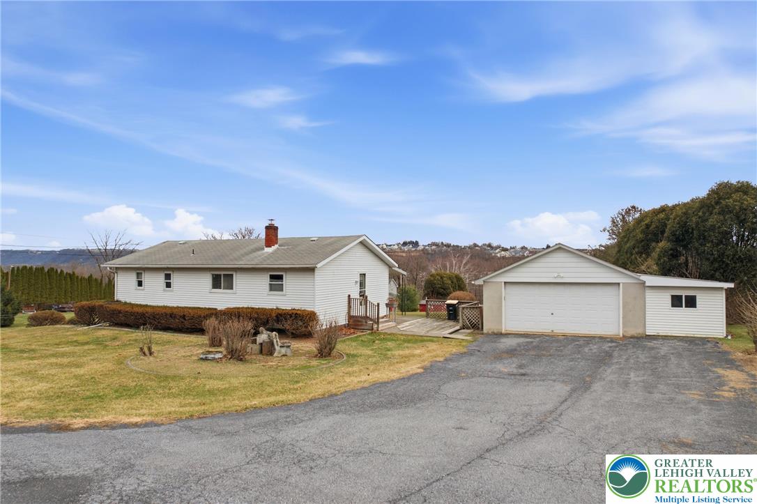 5478 2nd Street Whitehall, PA 18052 - Photo 4 of 30 a front view of a house with a yard
