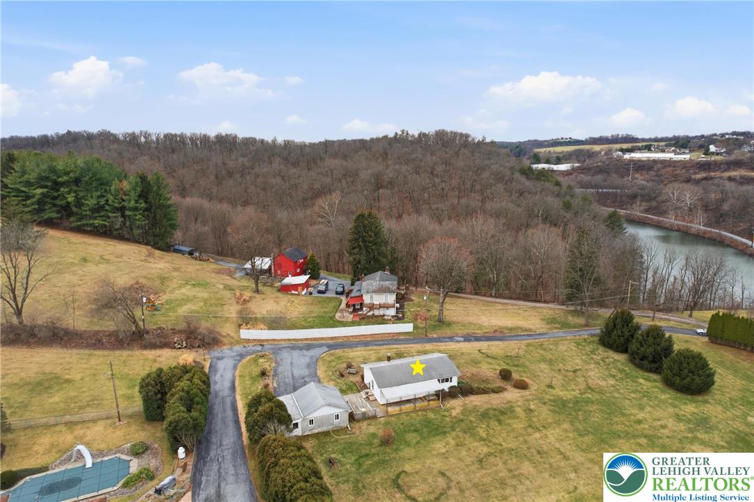 5478 2nd Street Whitehall, PA 18052 - Photo 7 of 30 a view of a swimming pool with a lake view and mountain view