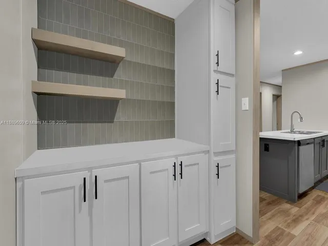 a view of a hallway with closet