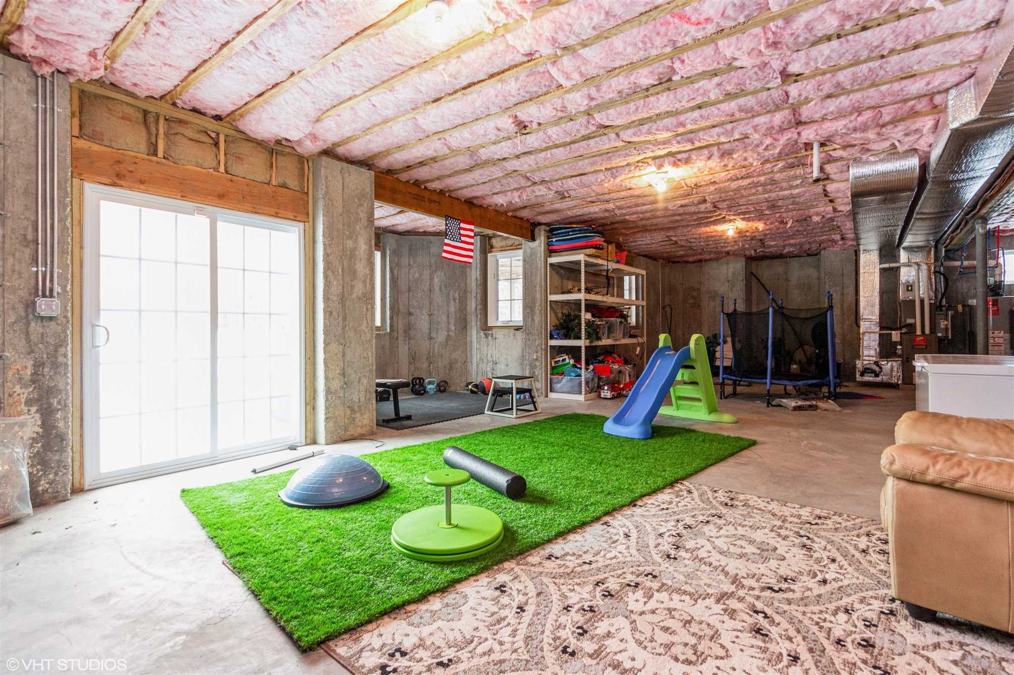 25 Riding Ridge Trail Beacon, NY 12508 - Photo 17 of 25 a view of a backyard with furniture and a table and chairs