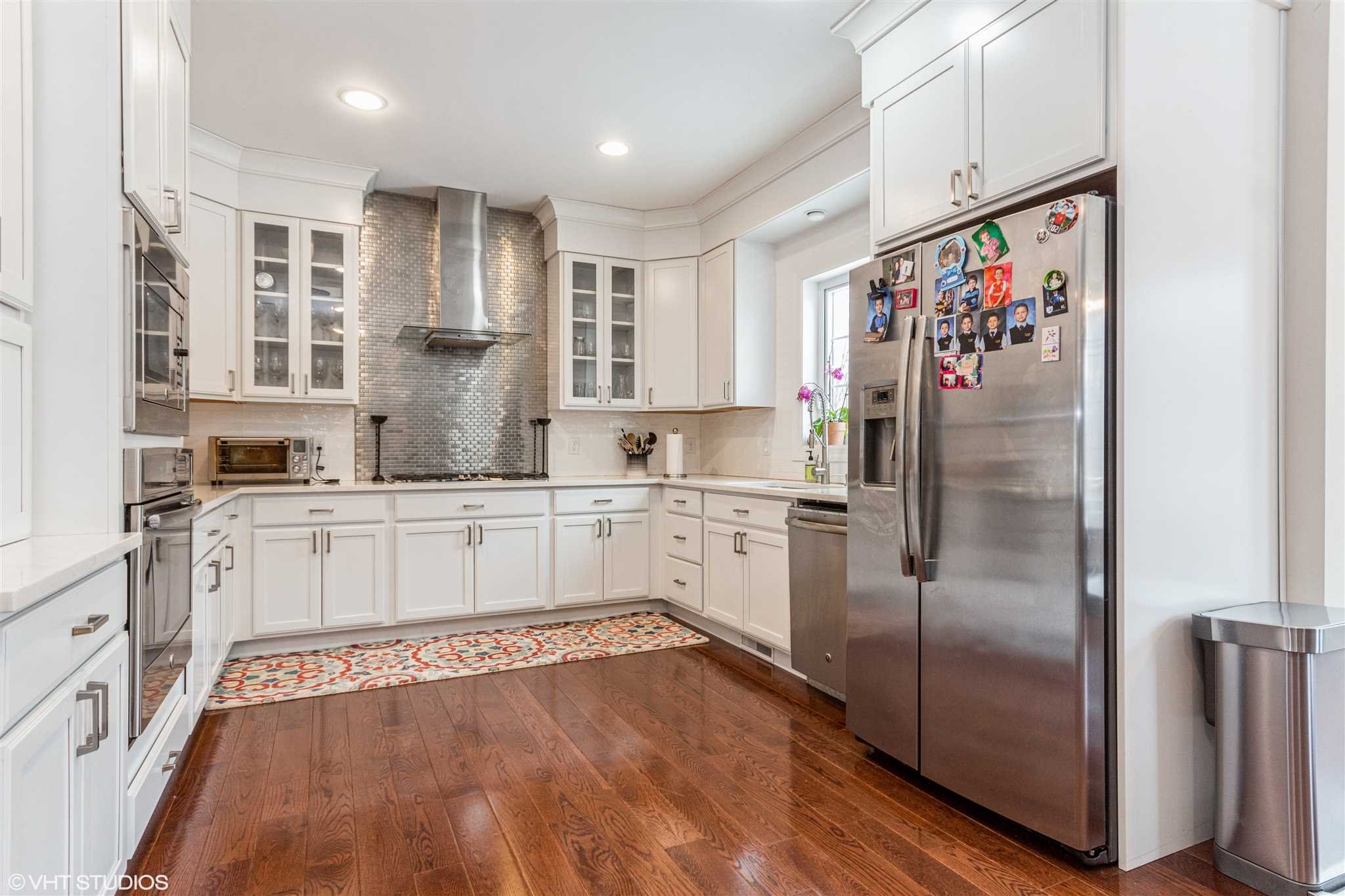 25 Riding Ridge Trail Beacon, NY 12508 - Photo 5 of 25 a kitchen with stainless steel appliances a refrigerator and a stove top oven